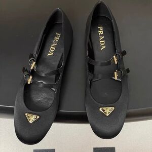 Prada Black Flats with Gold Details